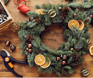 Christmas wreath with clippers and decorations.